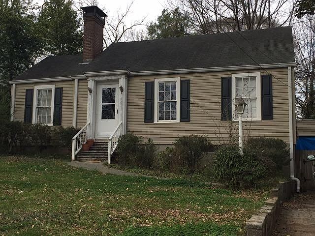 Front of the House. Driveway is to the right.