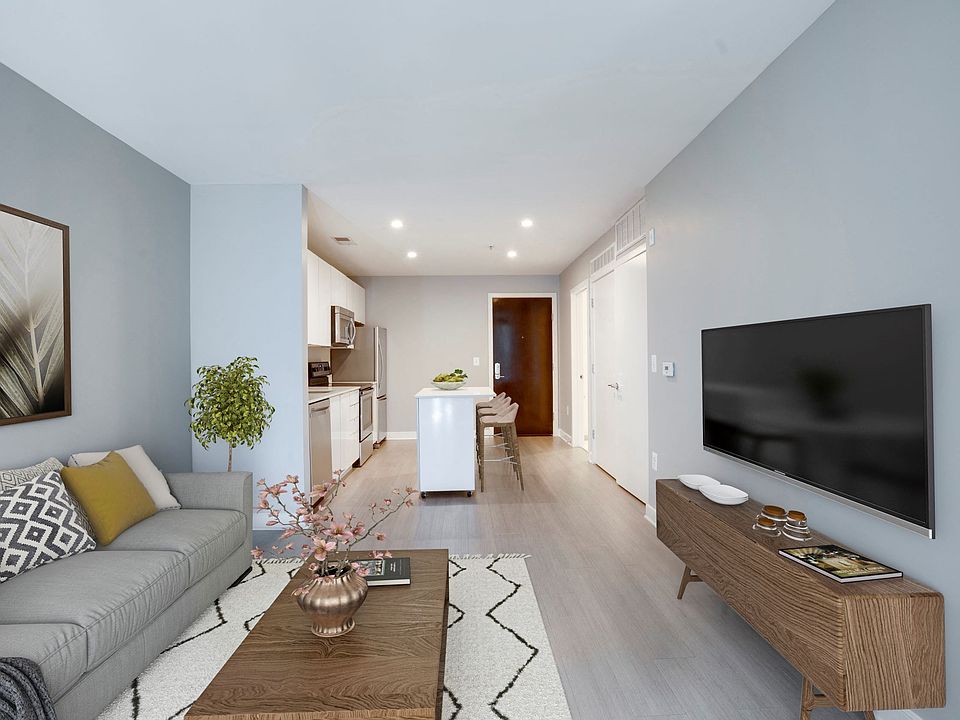 One-bedroom living and dining (virtually staged)