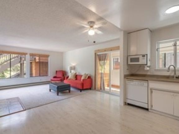 Open floor plan with convenient access to enclosed patio/sunroom for overflow.