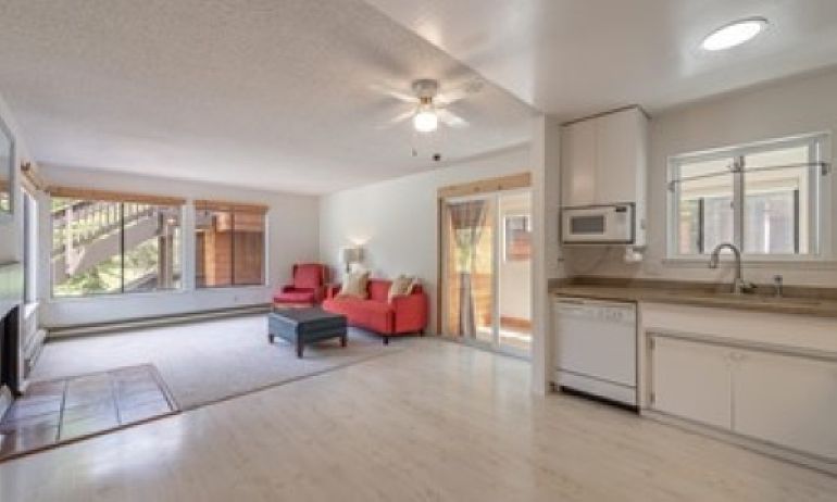 Open floor plan with convenient access to enclosed patio/sunroom for overflow.