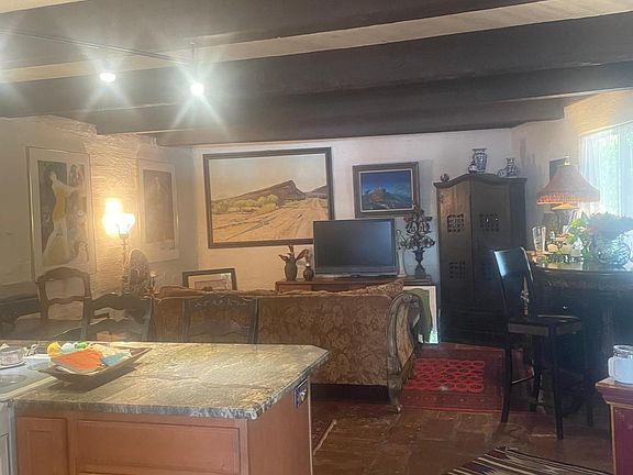 The open floor plan from the kitchen into the living area