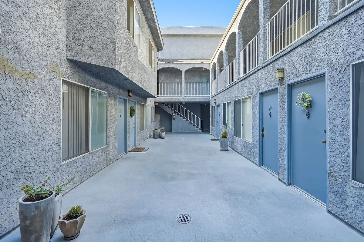 Building Photo - 10845 Camarillo St #108