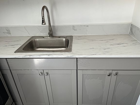 5th image of 213 Acme St