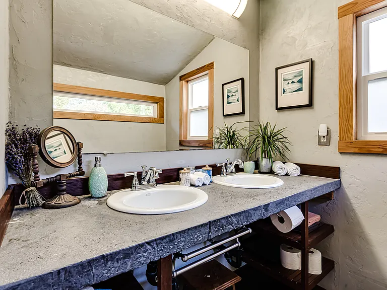 Double vanity and large window.