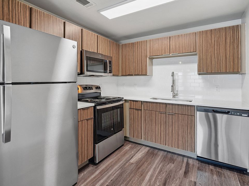 Renovated kitchen with stainless steel appliance package