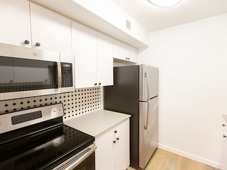 All kitchens feature full appliance package, including dishwashers.