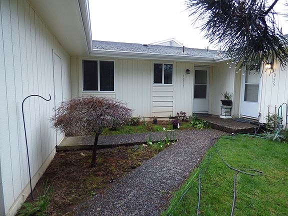 Front door to the left