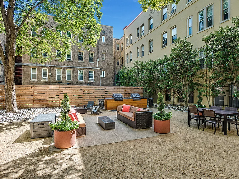 Courtyard with seating area and grills