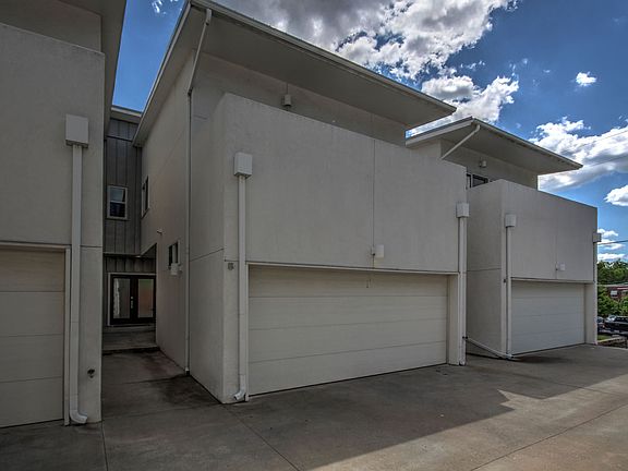 View of 2-Car Garage and Front Door Entryway.