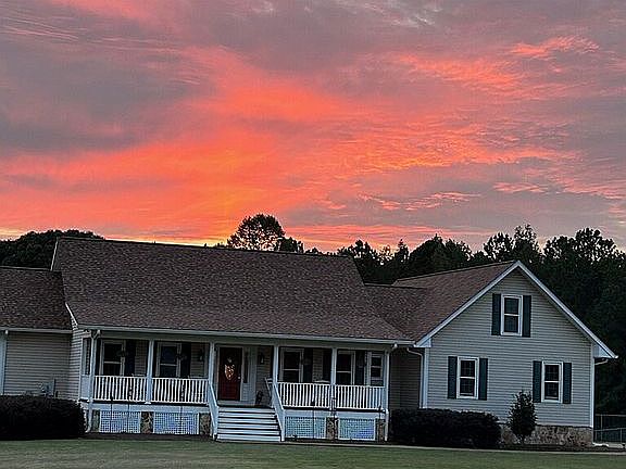 Sunset behind the house