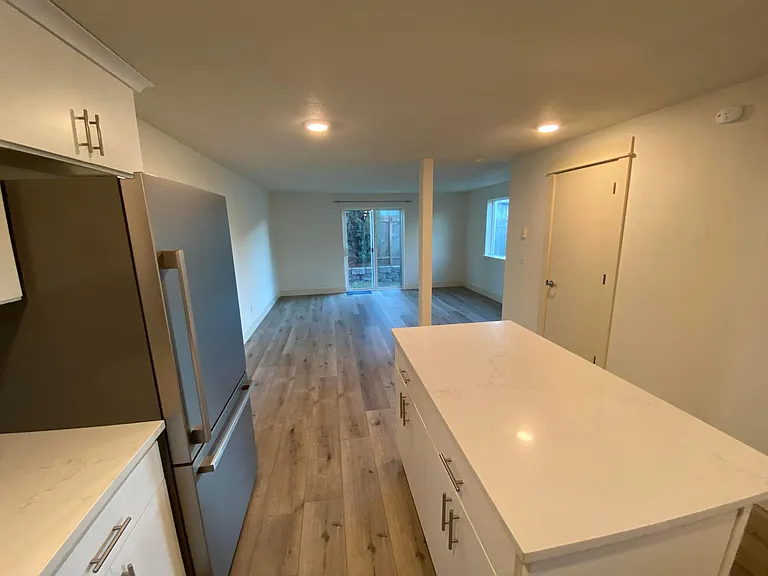 Kitchen looking into living room.