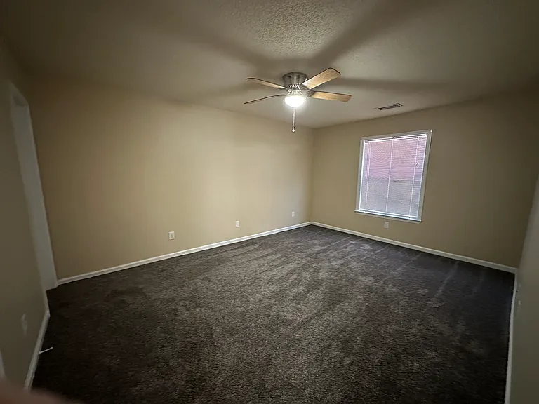 Master bedroom with ceiling fan light