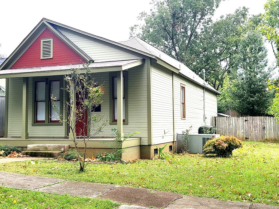 Enjoy relaxing on the front porch of this charming 1901 bungalow located one block from downtown Decatur. There's a driveway for your parking needs.