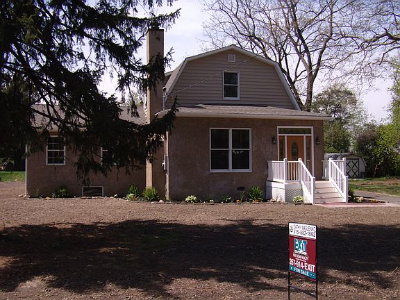 Another front view of house with EP Henry walkway going to porch,