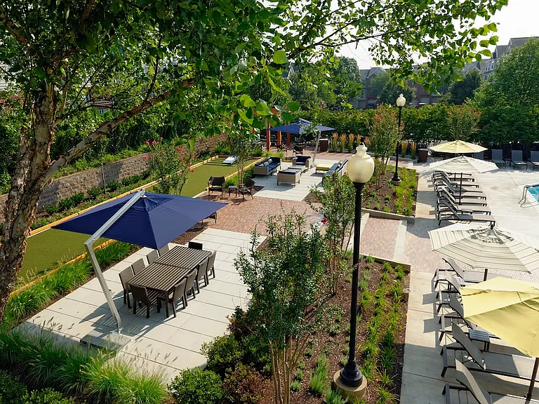 Courtyard with dining area, lounge seating and outdoor gaming area