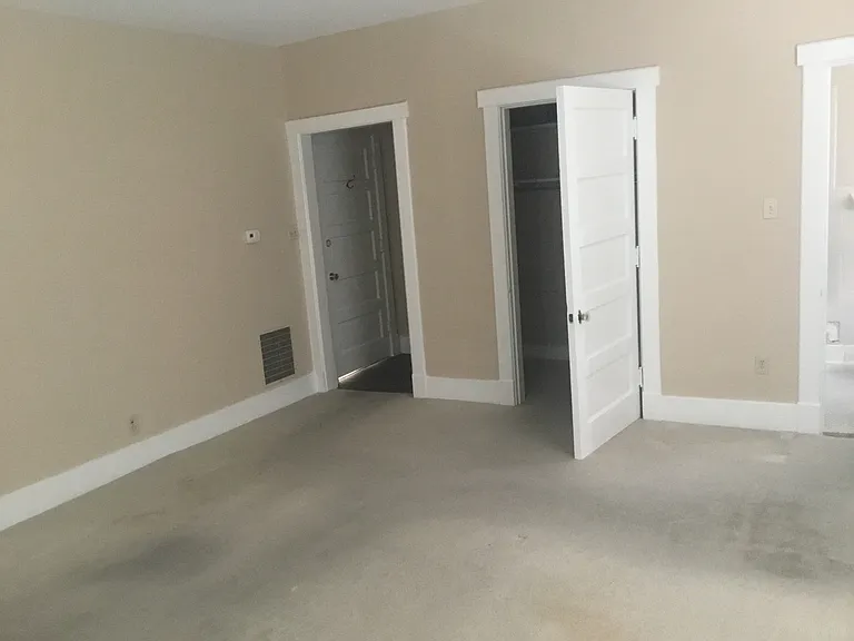 Large room with entry way and walk in closet