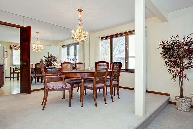 The formal dining room offers lots of natural lighting.