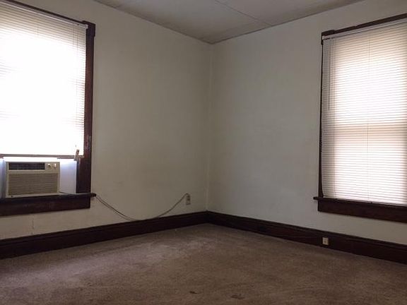 Large living room/bedroom with separate closet.