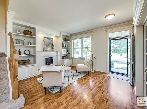 Living Room with built in shelves ~ Gas fireplace