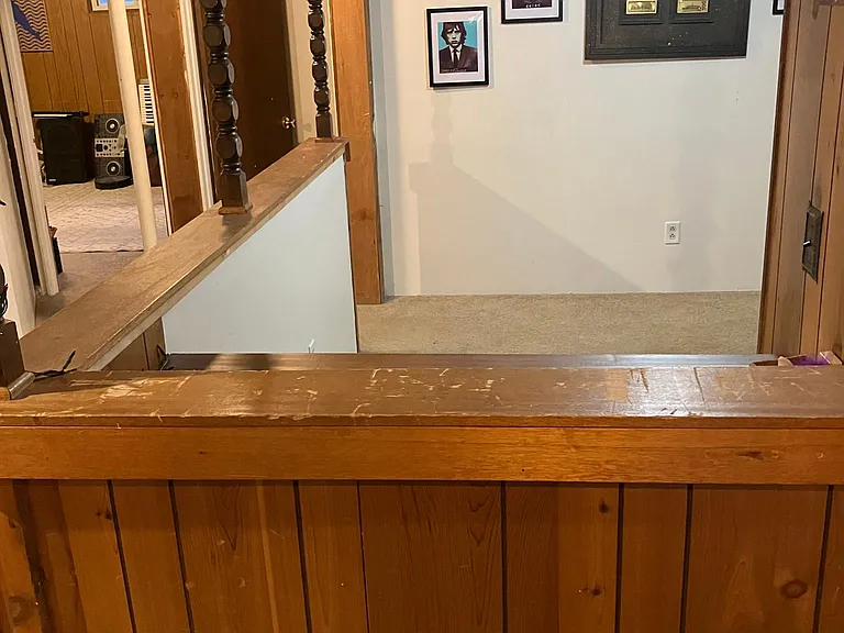 Looking towards open office area + extra rooms in basement