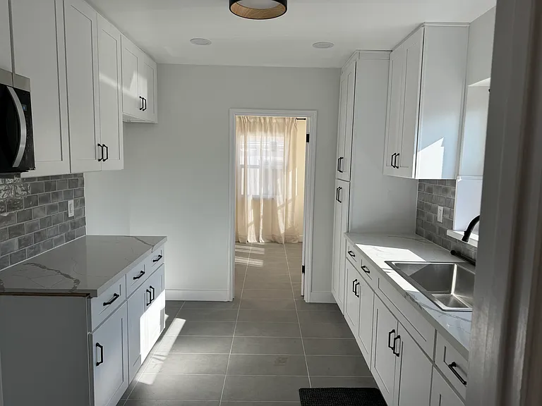 10606 Bryson Ave — Photo 6