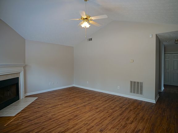 Living room with vaulted ceilings