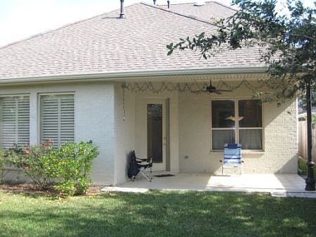 Covered porch on rear of home.