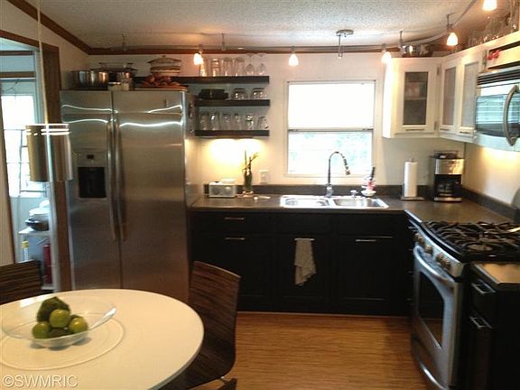 5th image of 10999 Grand River Dr SE
