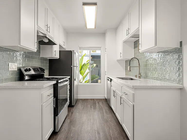 Cook, dine, and gather in a stylish kitchen space.