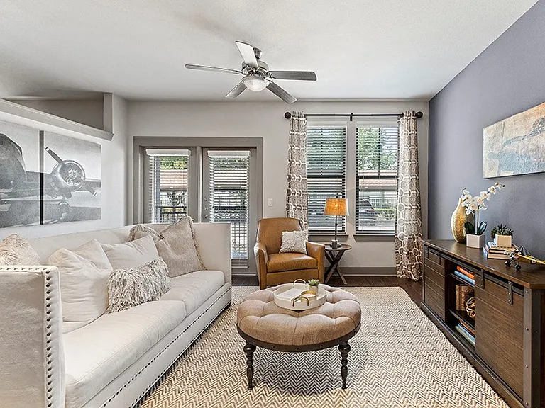 Spacious living rooms with ceiling fans