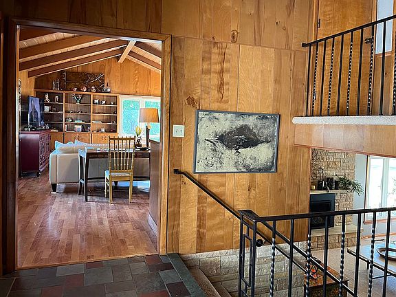 Foyer looking into den