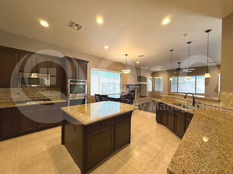 9648 E Lobo Ave — Photo 4