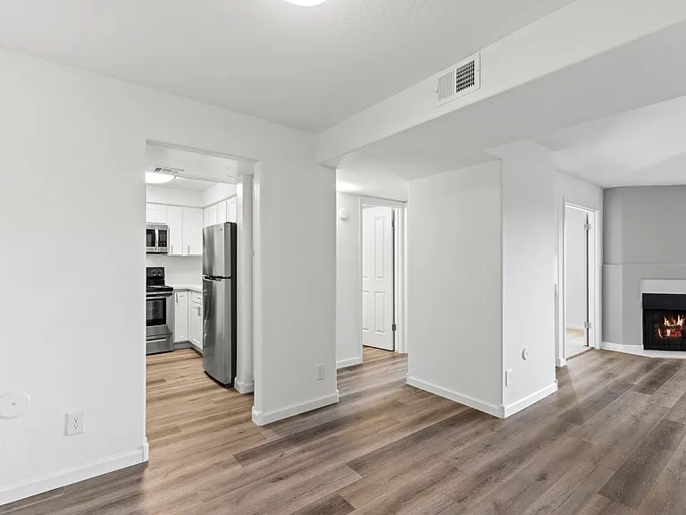 View from Dining room to Kitchen, Guest Bath and Living Room