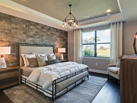 Private owner s suite with decorative tray ceiling and large window