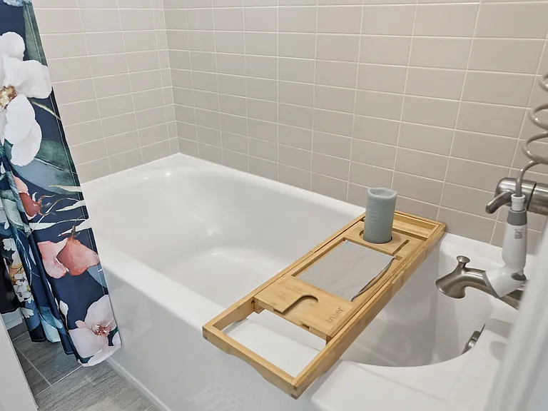 2nd bedroom's ensuite bathroom with tub.
