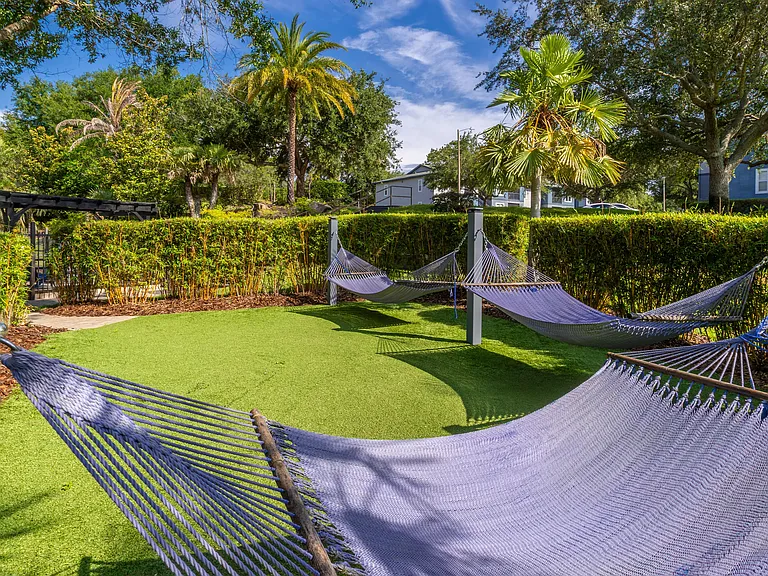 Whether you're soaking in the sun or enjoying a good book, our shaded hammock garden is designed for everyday relaxation.