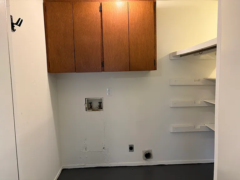 Electric W/D hook ups and clothes hanging racks