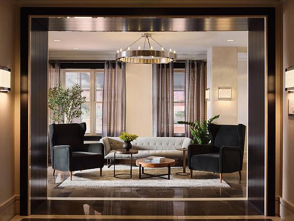 Hotel-inspired lobby with comfortable seating at The Metropolitan at 40 Park in Morristown, NJ.