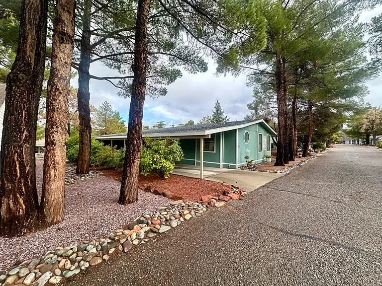 Left side of home.