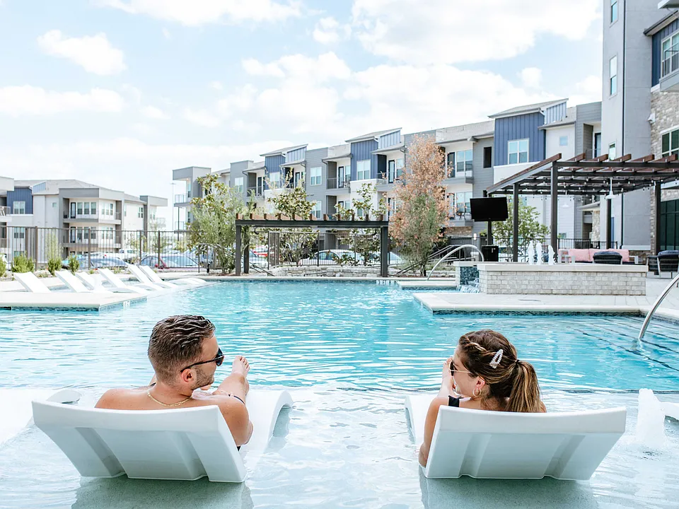 Resort-style pool with tanning ledge