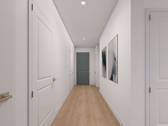Entry Way Leading to the Open Gathering Room, Dining, and Kitchen