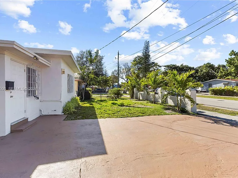 8031 NW 12th Ct — Photo 13
