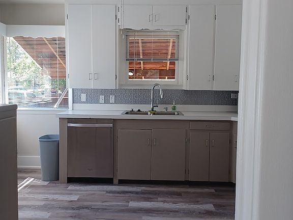 Kitchen - to the left is back door to the backyard.