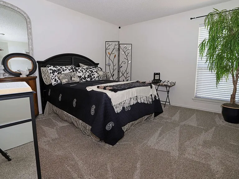 Additional bedroom view showcasing layout, space, and natural light