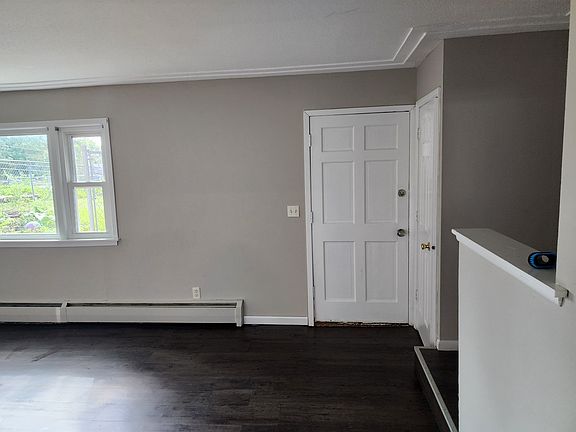 Living room towards front door.