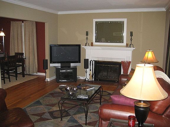 Renovated wood floors in spacious living area