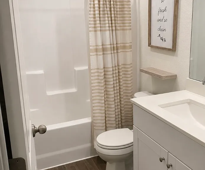 En-Suite Bathroom 1 (with tub and shower). Each bedroom has its own private bathroom and walk-in closet!