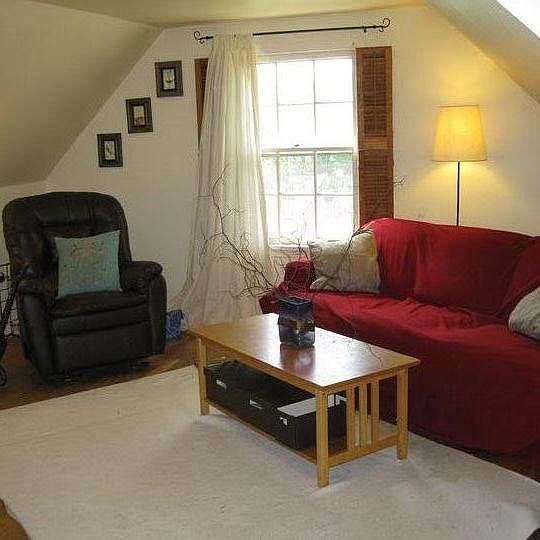 Living room area. Has coat closet and attic storage
