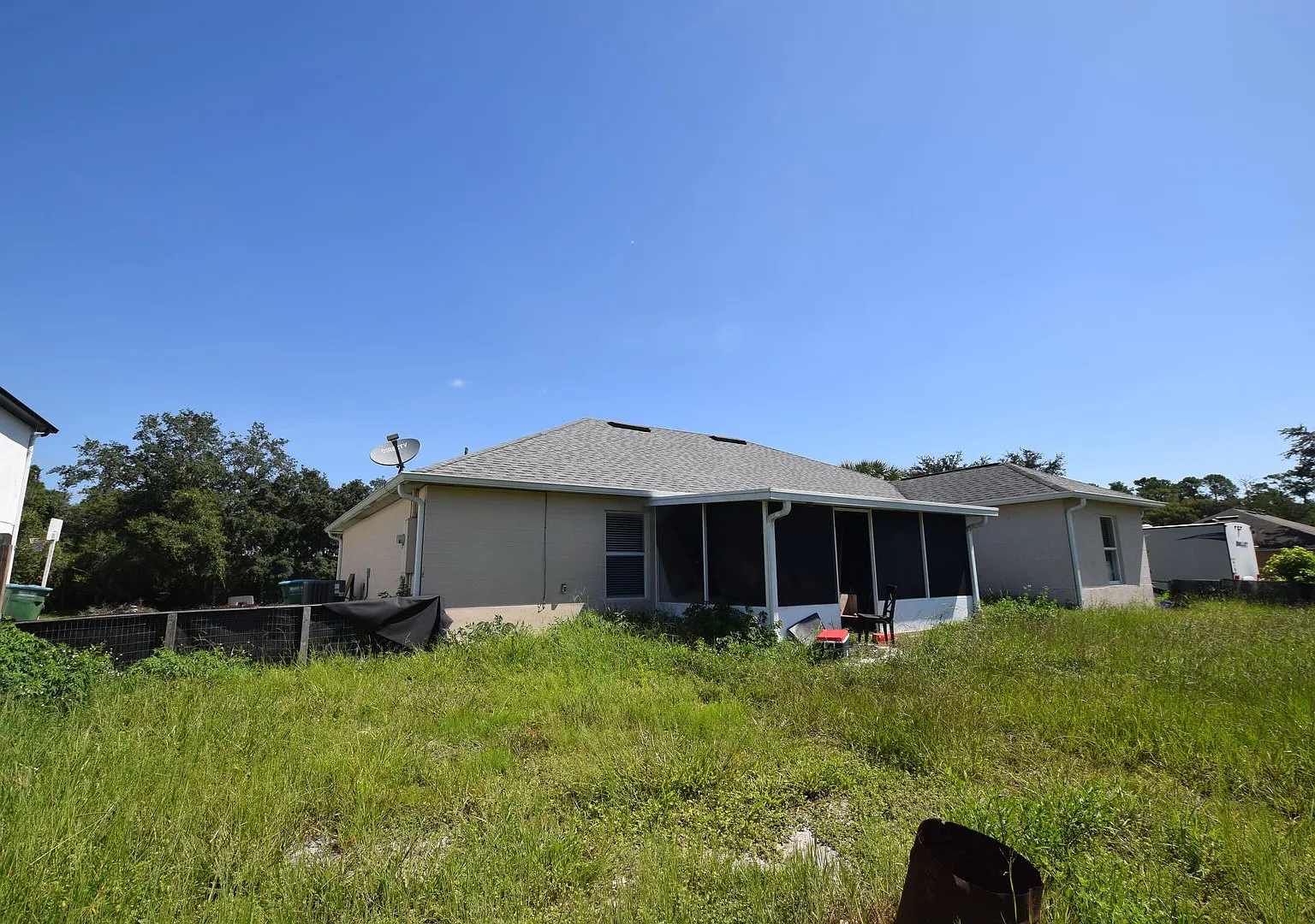 This charming 4 Bedroom, 2 Bath Single Family Home For Rent at 3785 Trade St. Deltona, FL 32738 — Photo 3