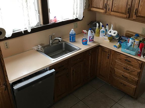 Dishwasher provided-Laundry hook-ups in basement with in/outside entry.